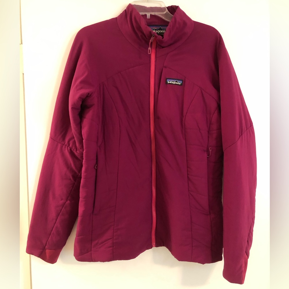 Women’s fuchsia lightweight Patagonia long sleeve jacket.